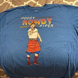 Homage Roddy Rowdy Piper Blue Graphic T-Shirt Design
